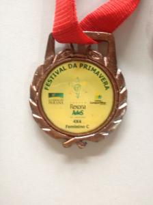 2006 - Festival de Primavera Mini 4x4 Feminino Centro Rexona Ades de Voleibol - medalha verso